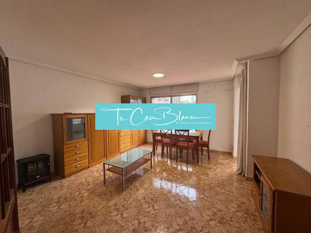 A four-room apartment with rustic furniture and marble flooring.