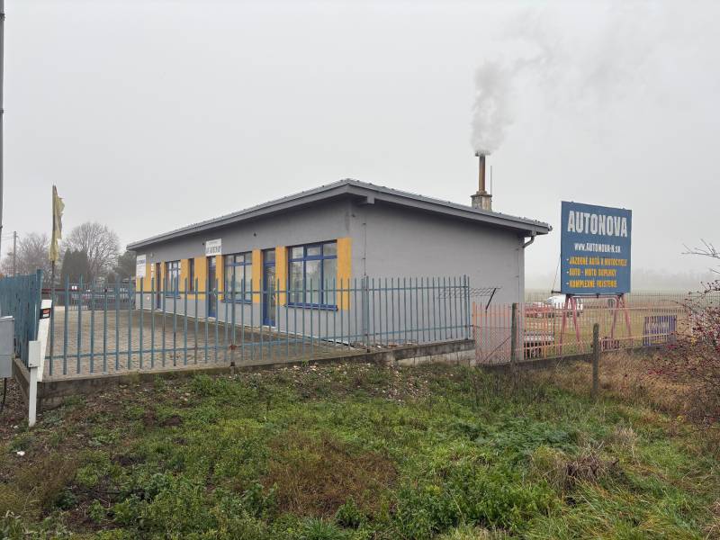 Building with the sign Autonova on Bratislavská Street in Veľký Biel, Land - housing.