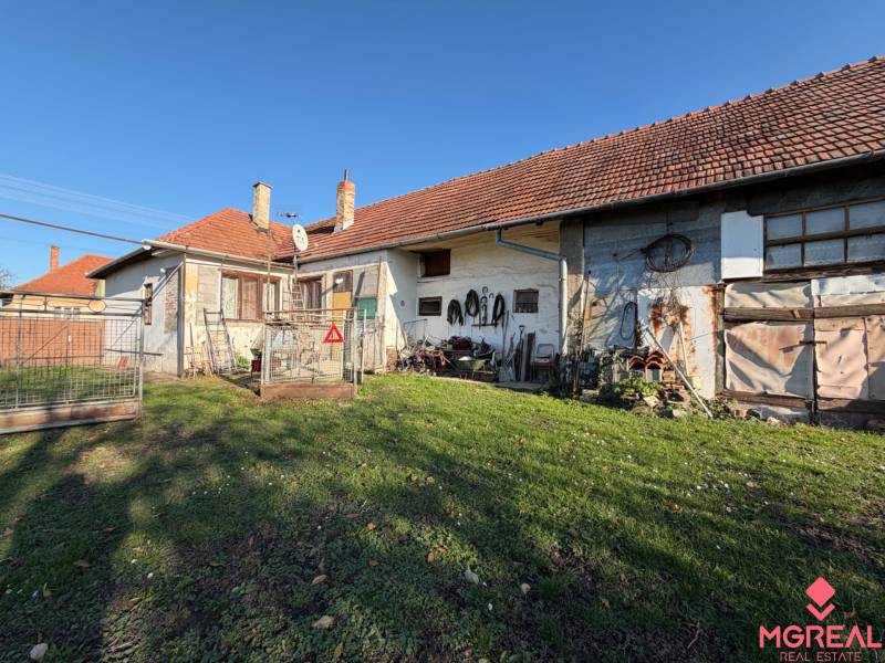 A family house on the main street in Súlovce with a spacious yard and a garage.