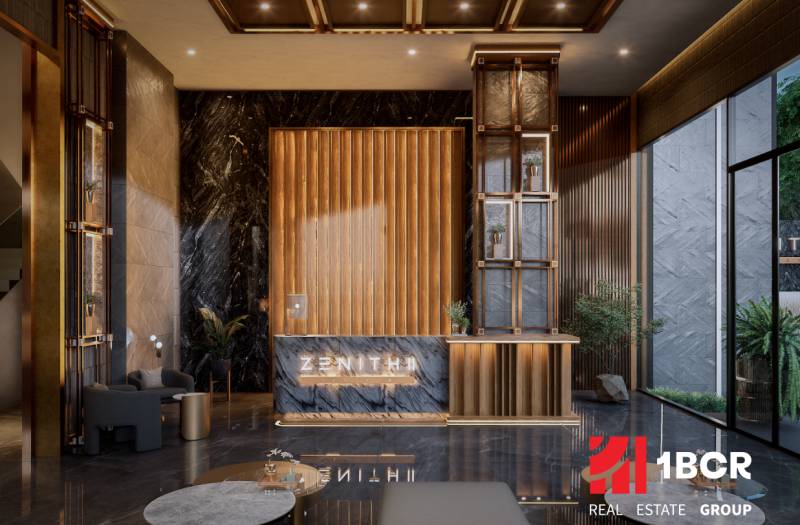 The interior of the entrance hall with a marble wall and a floor with a wooden design. Apartment construction.