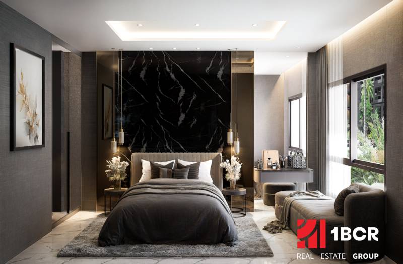 Luxury bedroom with dark walls and marble accents in a 2-room apartment.