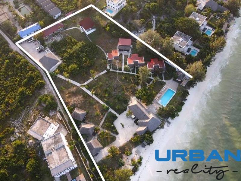 Aerial view of a beach resort in Paje, Zanzibar South East with a pool.