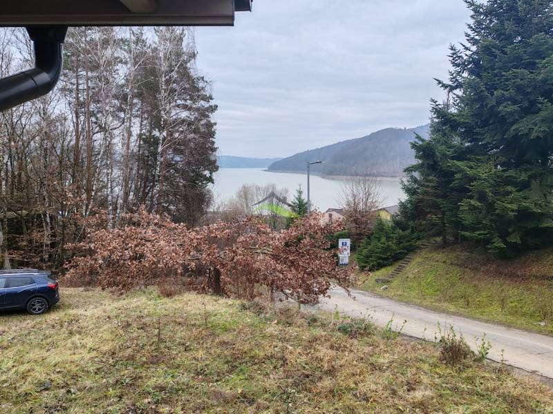 A view of the dam and greenery from the cottage on Main Street in Nova Kelc.