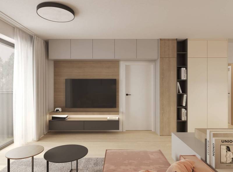 Living room with TV, wooden decor flooring, light curtains, furniture, and a bookshelf.