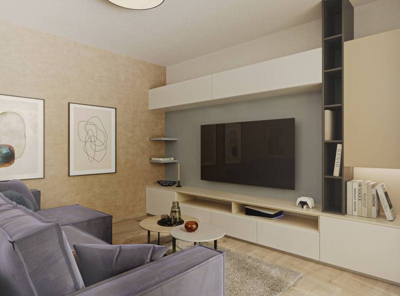 Living room interior with a comfortable couch, television, paintings, and a wooden-patterned floor.