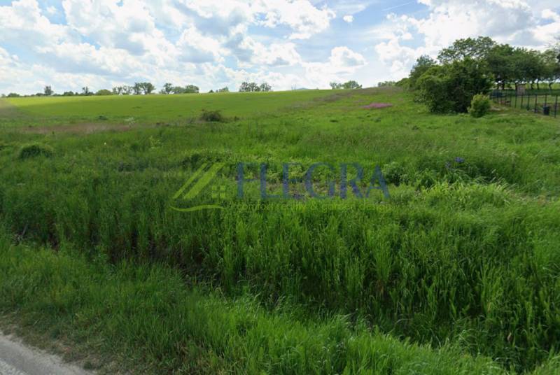 Land for residential use in Lomnicka, Vranov nad Topľou, with grassy area and hilly landscape.