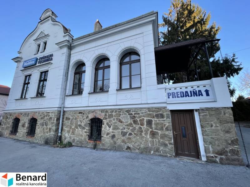 The building on Vajanského Street in Prešov with a stone ground floor and the inscription 