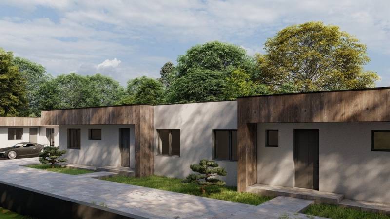 A family house in Žihárec with a continuous green garden and a seamless transition of the pathway.