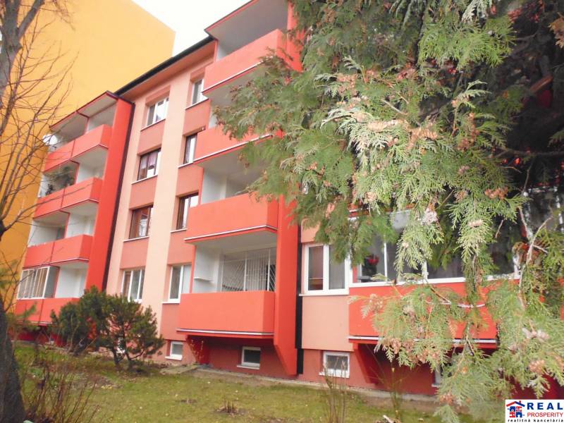 An apartment building on Marka Čulena Street in Prešov surrounded by greenery, offering a 2-room apartment.
