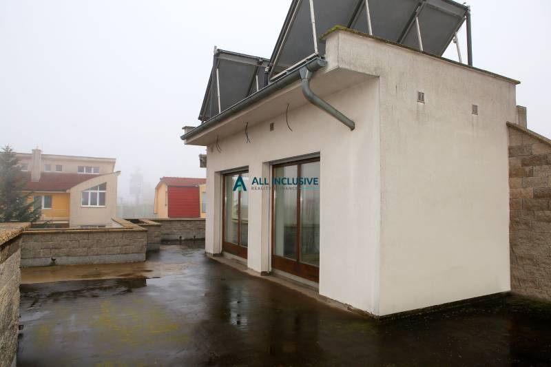 Family house on Súľovská Street in Bratislava - Ružinov, with a terrace and solar panels.