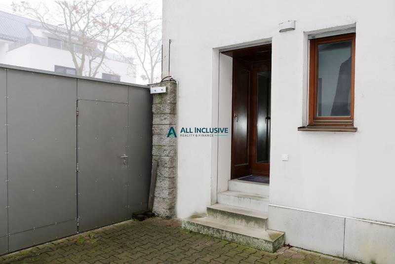 Entrance to the family house on Súľovská in Bratislava - Ružinov, next to the metal gate.