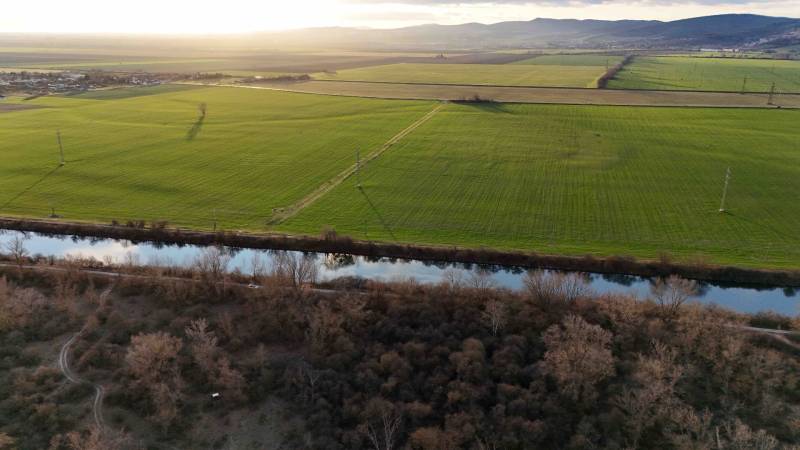 Meadows and river at dusk near Nová Ves nad Váhom, recreational grounds.