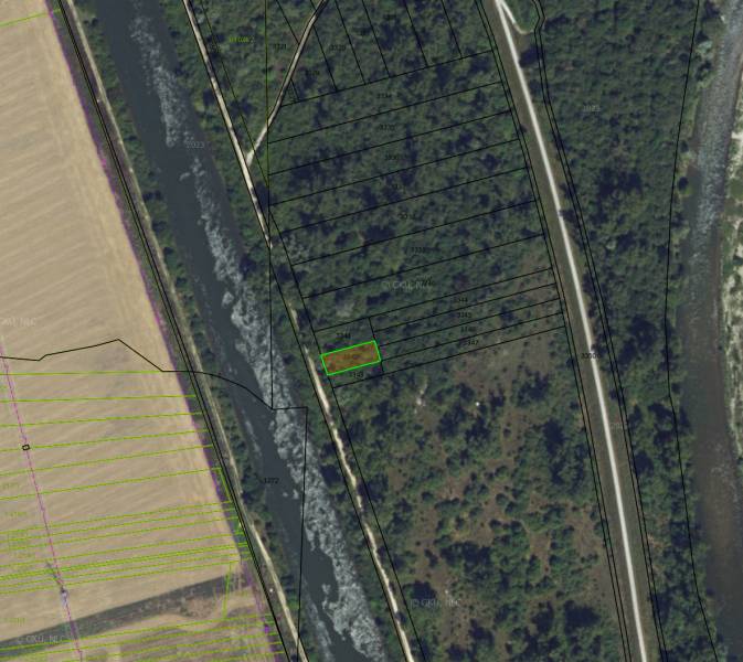 An aerial view of recreational lands in Nová Ves nad Váhom, surrounded by bodies of water.