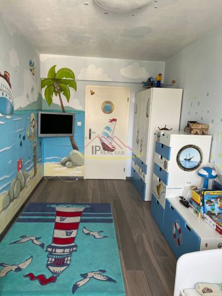 Children's room with a nautical theme, wooden decor flooring, furnishings for a 4-room apartment.