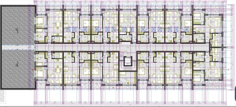 Floor plan of a building with multiple 2-bedroom apartments and a central corridor, ideal for Galanta.