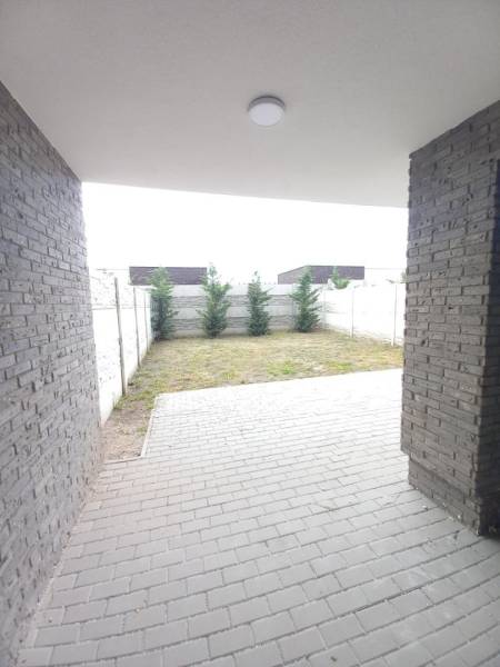 Reinforced terrace and small garden in Galanta by a 2-room apartment.