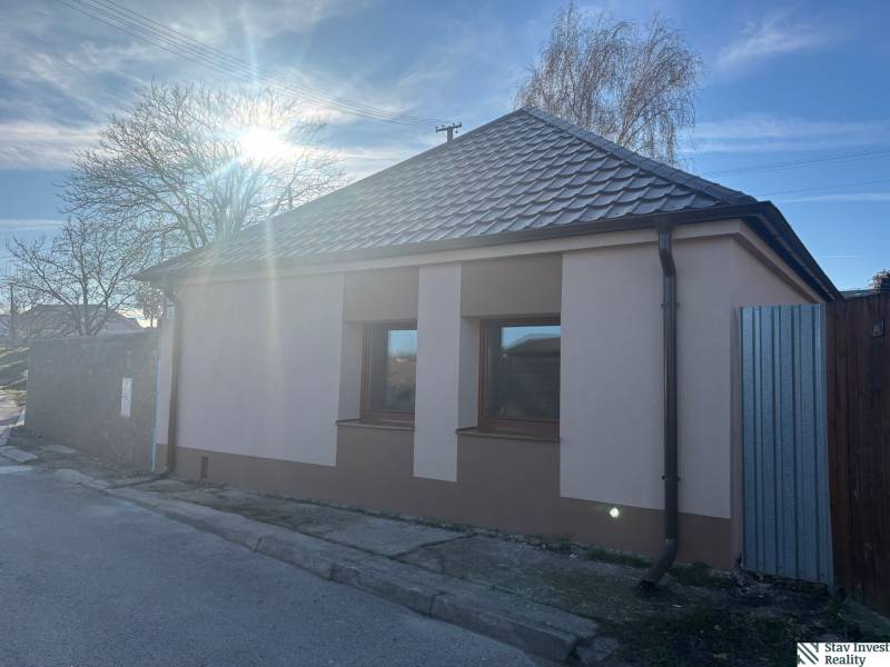 A family house in Blatné with a hipped roof and simple facade.