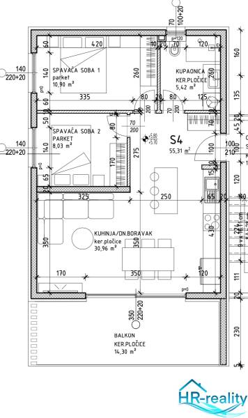 Floor plan of a holiday apartment with two bedrooms, a bathroom, and a balcony.