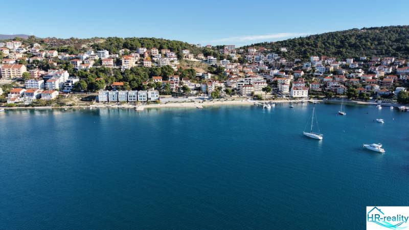 The coast with yachts and houses in Ciovo near recreational apartments.