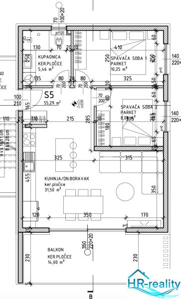 Floor plan of a vacation apartment with two bedrooms, a bathroom, and a spacious living area.