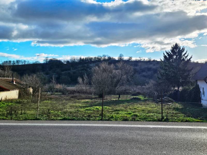 Land for residential use in Čifáre, on Čifáre street, surrounded by nature and trees.