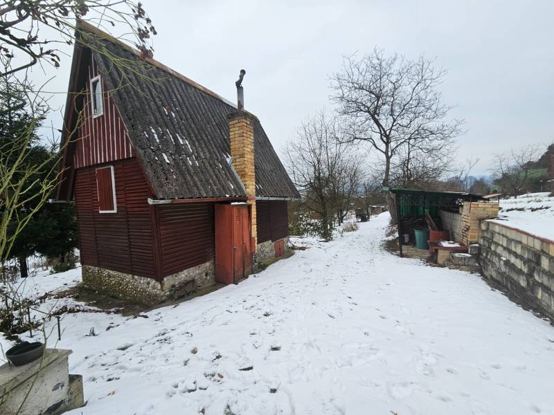 Cottage in Dubnica nad Váhom in Lieskovec in a winter setting with snow.