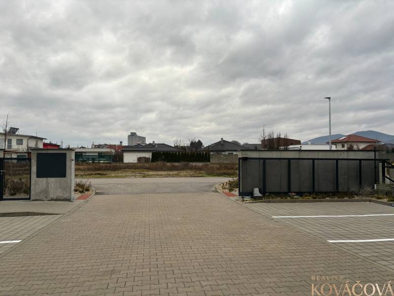 View of the entrance gate to Vladimír Predmerský in Trenčín, the surroundings of 3-room apartments.