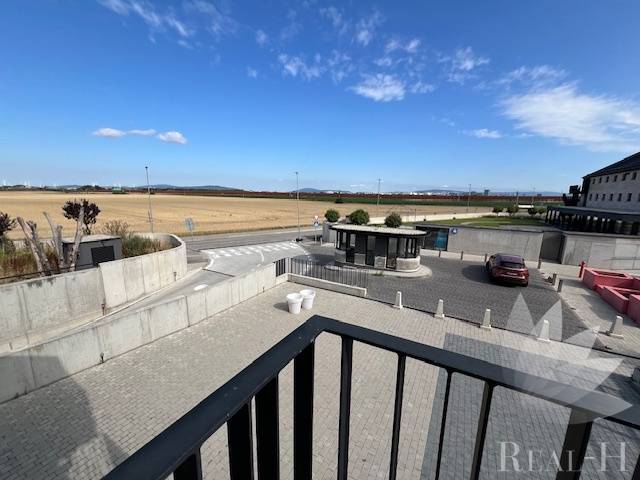 View from the balcony at the Square near the Granary in Bratislava - Jarovce, at a 2-room apartment.