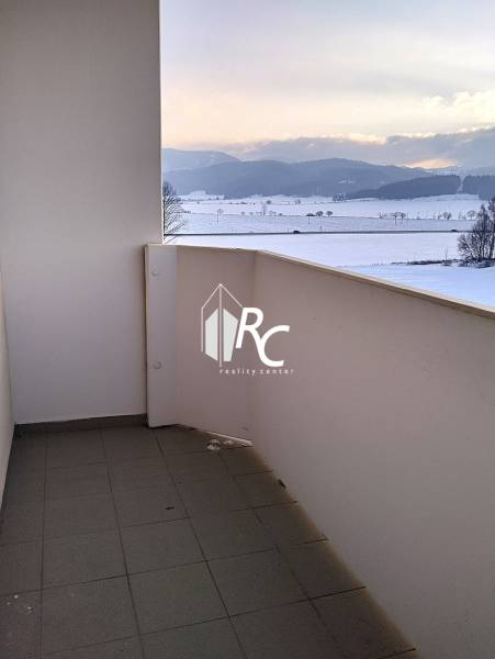 The balcony of a 2-room apartment on Slobody Street in Turčianske Teplice with a view of the countryside.
