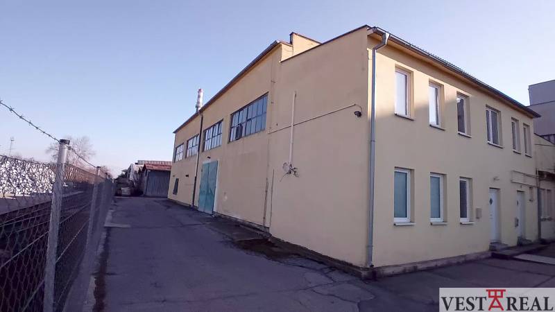 Building in Trnava on Coburgova Street, suitable for warehouses and halls.