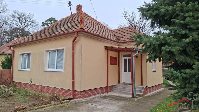 A family house in Nová Ves nad Žitavou on Nová Ves nad Žitavou street with a sloped roof.