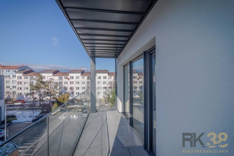 A balcony with a view of apartment buildings on Francisciho Street in Poprad, from a 2-room apartment.