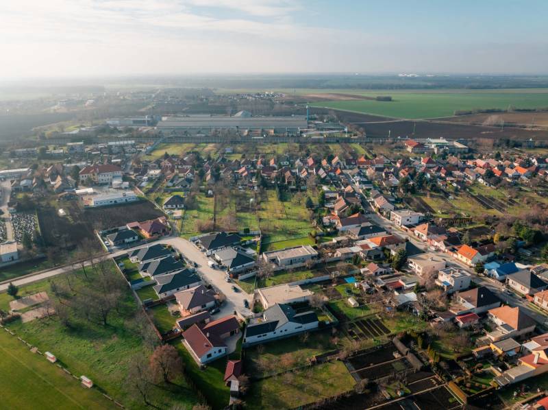 Aerial view of houses and gardens in the village of Vlčkovce, Land - residential.