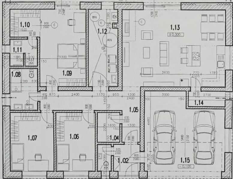 Floor plan of a family house in Semerovo with three bedrooms, two bathrooms, and a garage for two cars.
