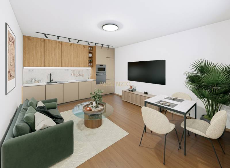 Living room with a kitchenette in a 2-room apartment, floor with a wooden decor.