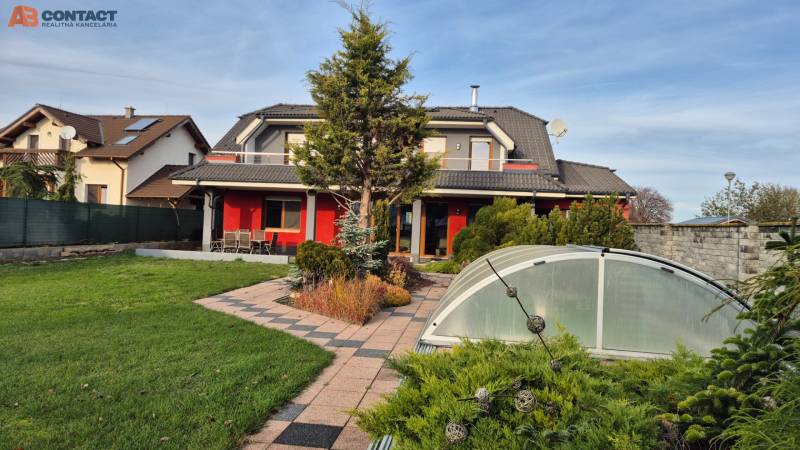 Family house on Veterná Street in Krakovany with a garden and a greenhouse.