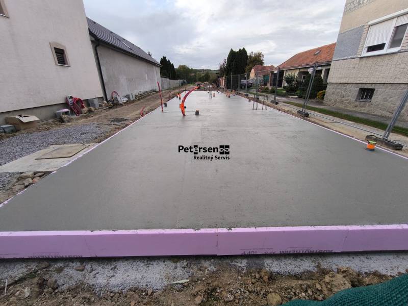 Foundations for a future building on Litoměřická Street in Topoľčianky, next to family houses.