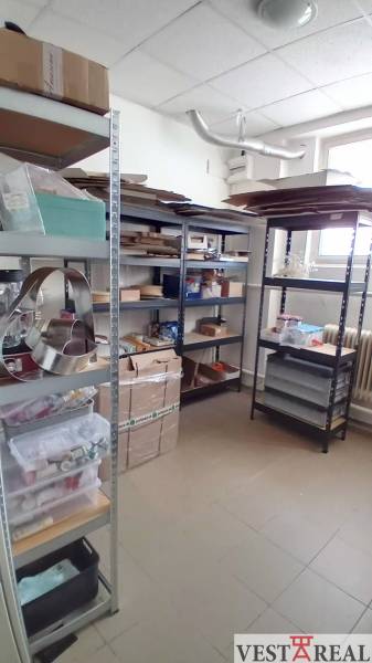 Shelving system with boxes and supplies in warehouses and halls.