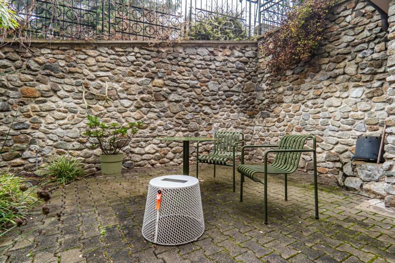 Stone wall on the terrace overlooking the garden, next to a 4-room apartment on Tichá Street, Bratislava - Staré Mesto.