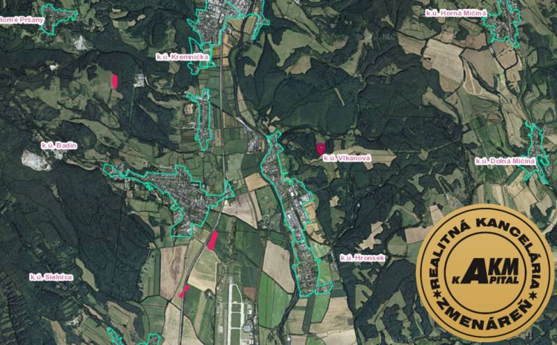 A geographical map shows agricultural and forest lands near the village of Badín and its surroundings.
