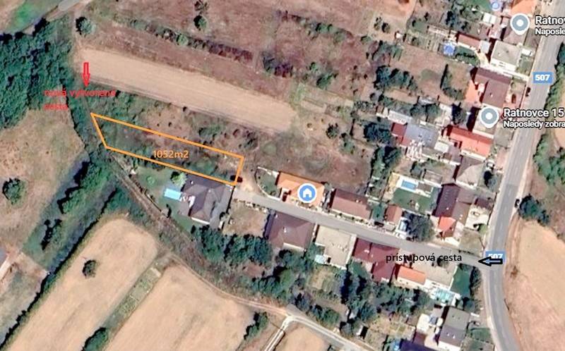 Aerial view of plots in Ratnovce suitable for living, surrounded by greenery and houses.