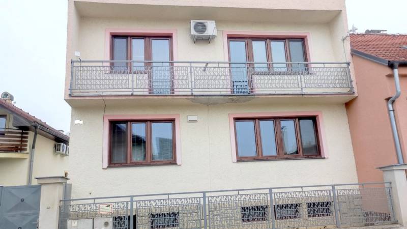 A building with balconies and air conditioning on Hodžova Street in Piešťany used as offices.