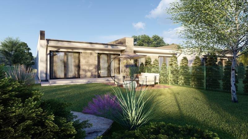 A family house in Veľké Janíkovce, Nitra, with a terrace, garden furniture, and a landscaped lawn.