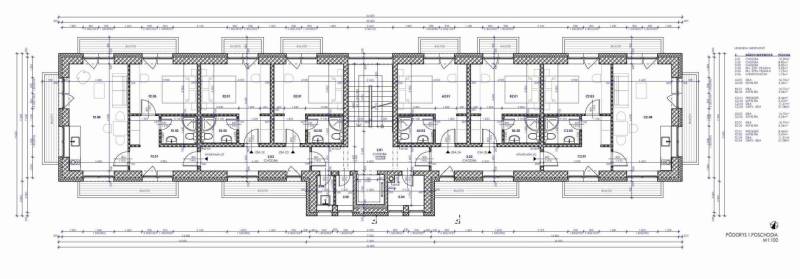 The floor plan of the first floor of the building includes rooms, corridors, and balconies.