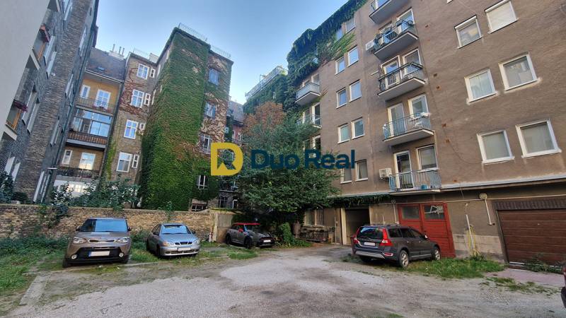 Parking lot near residential buildings on Grösslingova Street in Bratislava Old Town.