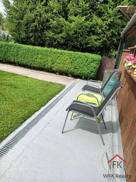 Garden with terrace and greenery on plots - living in Jasenovce on Jesenovce street.