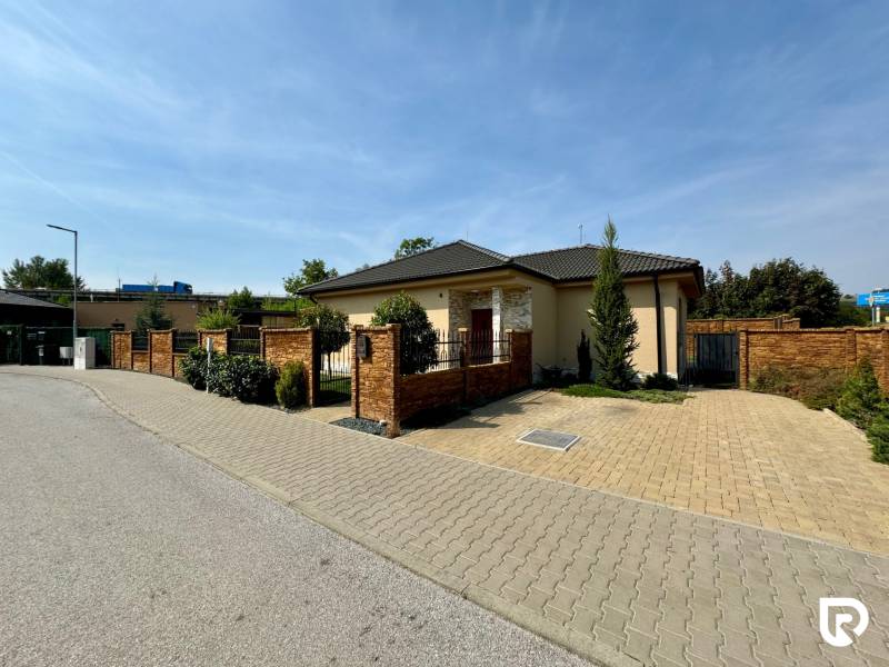 A family house on Pod privádzačom Street in Trenčín with a landscaped plot.