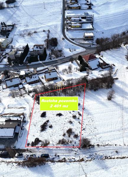 Snow-covered residential plots in Horná Mičiná, area 2,401 m².