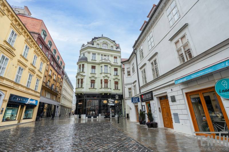 Laurinská Street in Bratislava - Old Town, surrounded by historical buildings and dining establishments.