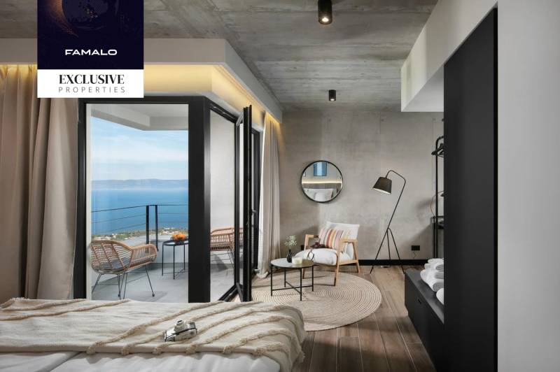 A room with a sea view, wooden decor flooring, villa.